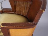 a brown chair with a yellow cushion and a brown chair with a brown seat