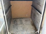 an image of a truck with a box in the back of it