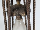 a light that is hanging from the side of a lamp