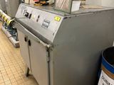 une image d'une machine qui se trouve dans une cuisine