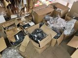 many boxes of assorted items sitting on the floor