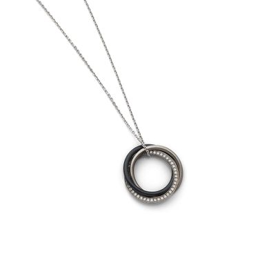 CARTIER COLLIER "Trinity" composé de trois anneaux : un pavé…