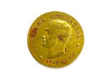 an image of a close up of a coin on a white surface