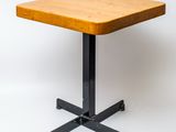 an image of a small table with a wooden top