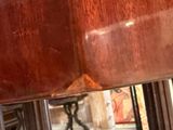 a close up of a piece of wood on a table