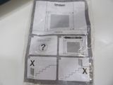a picture of a piece of paper that is on a table