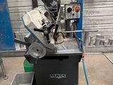 a machine that is sitting on a table in a garage