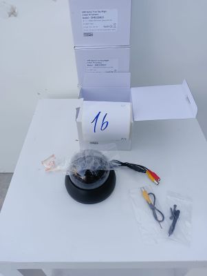 a white table with a black object on top of it