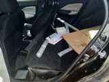 a car that has a box in the back of it
