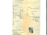 une image d'un document sur lequel figure la photo d'un homme