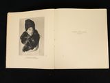 an open book with a picture of a woman in a fur coat