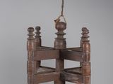 a bird that is sitting on top of a wooden table