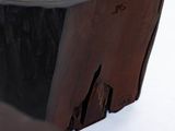 a wooden bowl sitting on top of a table