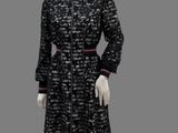 black and white dress with red trims on mannequin mannequin mannequin mannequin mannequin mannequin mannequin manne