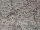 an old map of a country with a red line in the middle of it