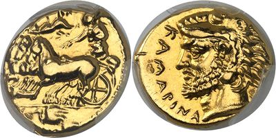 a gold coin with an image of a man on it