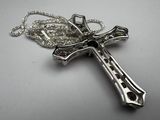 sterling silver cross pendant with garnett stones on a silver chain