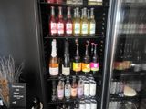 a refrigerator that has a lot of bottles of alcohol in it
