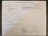 une photo d'un document sur lequel figure la photo d'une personne