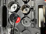 a close up of a tool box with tools inside of it