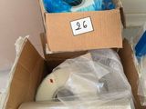 a box with a roll of tape and a roll of tape in it