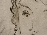 drawing of a woman ' s face with her hair in a bunt