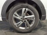 a close up view of a tire on a car