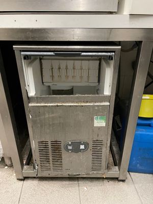 an image of a commercial ice cream machine in a kitchen