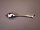 a spoon that is sitting on a table