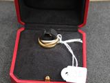 a wedding ring in a red box with a price tag