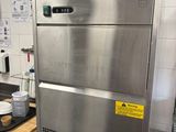 a stainless steel counter top in a commercial kitchen