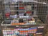 a metal cart with many books on top of it