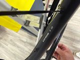 a close up of a person ' s hand holding a bike
