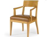 an image of a wooden chair with a brown leather seat