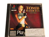 a cd case with a picture of a woman holding a gun