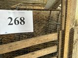 a sign on the door of a chicken coop stating that it is 26