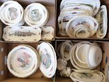many plates and bowls in a box on the floor