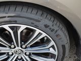 a close up of a tire on a car ' s rim
