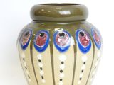 a vase with a design on it on a white background