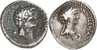 a silver coin with an image of a woman on it