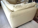 a couch and a chair in a living room