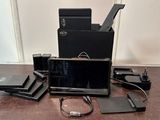 a lot of electronics that are on the table