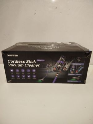 a box of cordless stick vacuum cleaner sitting on a counter