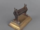an antique bronze figurine of a horse on a stand