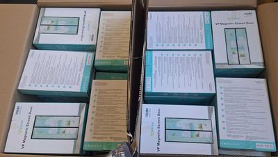 several boxes of electronic devices are stacked on top of each other