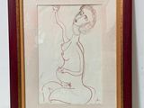 framed drawing of a woman sitting on her knees with her hand up in the air