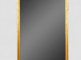 an image of a mirror with a wooden frame on a white background