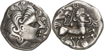 a close up of a coin with a horse on it