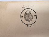 une vieille enveloppe sur laquelle est apposé un timbre et un cachet