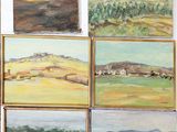 several paintings of a mountain range are displayed on a white surface